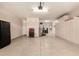 Spacious garage features epoxy floors, built in cabinetry, and plenty of room for storage and organization at 2440 W Arroyo Way, San Tan Valley, AZ 85144