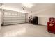 Garage interior showcasing a large garage door and ample space at 2440 W Arroyo Way, San Tan Valley, AZ 85144