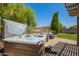 Outdoor hot tub with manicured backyard, patio furniture, and privacy fence at 2440 W Arroyo Way, San Tan Valley, AZ 85144