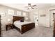 Comfortable main bedroom with ceiling fan and natural light from window at 2440 W Arroyo Way, San Tan Valley, AZ 85144