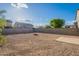 View of a backyard featuring desert landscaping and privacy fence at 30944 N Bramwell Ave, San Tan Valley, AZ 85143
