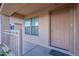 Inviting front porch with a view of the well-maintained landscape at 30944 N Bramwell Ave, San Tan Valley, AZ 85143