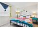 Nicely decorated bedroom with colorful bedding and decorative wall art at 3314 N 68Th St # 129, Scottsdale, AZ 85251