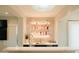 Entertainment area with a bar, complete with drink taps and a stylish backsplash at 3669 E Boot Track Trl, Gilbert, AZ 85296