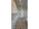 Modern bathroom features a stylish marble rain shower with a glass door and geometric patterned accent tiles at 3669 E Boot Track Trl, Gilbert, AZ 85296