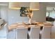 An elegant dining area with stylish chandelier, dining table and decor at 3669 E Boot Track Trl, Gilbert, AZ 85296