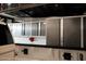 Garage interior with truck, epoxy flooring, and cabinet storage at 3669 E Boot Track Trl, Gilbert, AZ 85296