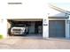 View of the home's garage, complete with truck, and ample storage at 3669 E Boot Track Trl, Gilbert, AZ 85296