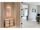 Hallway leading into a carpeted bedroom with ample natural light at 3669 E Boot Track Trl, Gilbert, AZ 85296