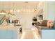 Bright, eat-in kitchen features marble counters, pendant lighting, and stainless appliances at 3669 E Boot Track Trl, Gilbert, AZ 85296