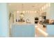 Bright kitchen featuring a large island, sleek stainless steel appliances, and modern finishes at 3669 E Boot Track Trl, Gilbert, AZ 85296