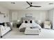 Spacious main bedroom with sitting area, plush carpet, and large windows for ample light at 3669 E Boot Track Trl, Gilbert, AZ 85296
