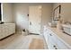 Well-organized mud room with storage cabinets, drawers, and decorative accents at 3669 E Boot Track Trl, Gilbert, AZ 85296