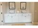 Mud room featuring drawers and cabinets with white decorative accents, and paintings at 3669 E Boot Track Trl, Gilbert, AZ 85296