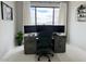 Well-lit office space with a modern desk setup and comfortable seating at 3669 E Boot Track Trl, Gilbert, AZ 85296