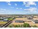 New home in an expansive desert landscape, showcasing wide streets and mountain views in the distance at 3933 E Freeman Ln, San Tan Valley, AZ 85140