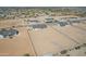 Sprawling aerial perspective displaying the community, new home construction, and desert surroundings at 3933 E Freeman Ln, San Tan Valley, AZ 85140