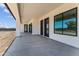 Covered patio with elegant design features and ample space for outdoor seating and entertaining at 3933 E Freeman Ln, San Tan Valley, AZ 85140