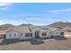 Stunning single-story home with modern farmhouse design, desert landscaping, and mountain views at 3933 E Freeman Ln, San Tan Valley, AZ 85140