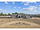 Stunning exterior view of a single-Gathering home, highlighting its well-manicured landscaping and inviting curb appeal at 3933 E Freeman Ln, San Tan Valley, AZ 85140
