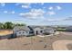 Attractive single-story home with desert landscaping, white siding, and a three-car garage at 3933 E Freeman Ln, San Tan Valley, AZ 85140