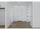 A modern home featuring a bright hallway that provides access to various rooms at 3933 E Freeman Ln, San Tan Valley, AZ 85140