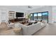Open living room featuring modern furniture and large sliding glass doors to outdoors at 3933 E Freeman Ln, San Tan Valley, AZ 85140