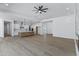 The open floor plan includes a modern kitchen, dining, and living areas filled with natural light at 3933 E Freeman Ln, San Tan Valley, AZ 85140