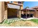 Large backyard with a covered patio area, seating, and built-in grill at 4061 E Torrey Pines Ln, Chandler, AZ 85249