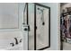 Modern bathroom with glass-enclosed shower, soaking tub, and neutral-toned design at 4061 E Torrey Pines Ln, Chandler, AZ 85249