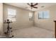 Spacious bedroom with three windows and neutral carpet, perfect for creating a comfortable retreat at 4061 E Torrey Pines Ln, Chandler, AZ 85249