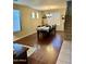 Inviting dining room with hardwood floors and staircase access at 4061 E Torrey Pines Ln, Chandler, AZ 85249