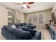 Comfortable living room with a large sectional sofa and lots of natural light at 4061 E Torrey Pines Ln, Chandler, AZ 85249