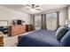 Main bedroom with great natural lighting, a ceiling fan, and plenty of drawer space at 4061 E Torrey Pines Ln, Chandler, AZ 85249