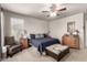 Comfortable main bedroom with furniture, carpet, and great natural lighting at 4061 E Torrey Pines Ln, Chandler, AZ 85249