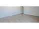 Comfortable bedroom featuring neutral walls and luxury vinyl plank flooring at 4209 N 48Th Ave, Phoenix, AZ 85031