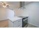 Bright kitchen features an island with white marble countertops and a stainless steel oven at 4209 N 48Th Dr, Phoenix, AZ 85031
