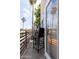 Cozy balcony with outdoor seating, offering a relaxing view of the surrounding neighborhood at 4343 N 21St St # 213, Phoenix, AZ 85016