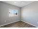 This charming bedroom has wood floors and lots of light from the large window at 4343 N 21St St # 213, Phoenix, AZ 85016