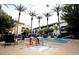 Community pool and hot tub with lounge chairs and palm trees enhance outdoor living at this complex at 4343 N 21St St # 213, Phoenix, AZ 85016