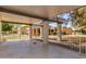 Covered patio with neutral decor and views of other homes and surrounding landscaping at 45 Leisure World -- # 45, Mesa, AZ 85206