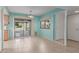 Dining area with tile floors, sliding glass door access to the patio, and a view of the backyard at 45 Leisure World -- # 45, Mesa, AZ 85206