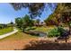 Scenic view of Lago Lindo, a serene pond with lush foliage and clear skies at 45 Leisure World -- # 45, Mesa, AZ 85206