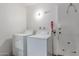 Functional laundry room with appliances and a door leading outside at 45 Leisure World -- # 45, Mesa, AZ 85206