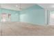 Spacious living room with carpet flooring and a ceiling fan for added comfort and efficiency at 45 Leisure World -- # 45, Mesa, AZ 85206