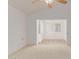 Living room with neutral carpeting and a ceiling fan at 45 Leisure World -- # 45, Mesa, AZ 85206