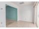 Inviting room with light tile flooring, adjacent to a room with neutral carpet at 45 Leisure World -- # 45, Mesa, AZ 85206