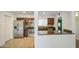 A spacious kitchen with granite counters, stainless steel appliances, and bright, neutral tones at 5038 N 20Th Ave, Phoenix, AZ 85015