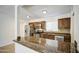 Updated kitchen with granite countertops, stainless steel appliances and bright, neutral tones at 5038 N 20Th Ave, Phoenix, AZ 85015