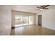 Bright living room with tiled floors and sliding doors leading to an enclosed patio at 5038 N 20Th Ave, Phoenix, AZ 85015